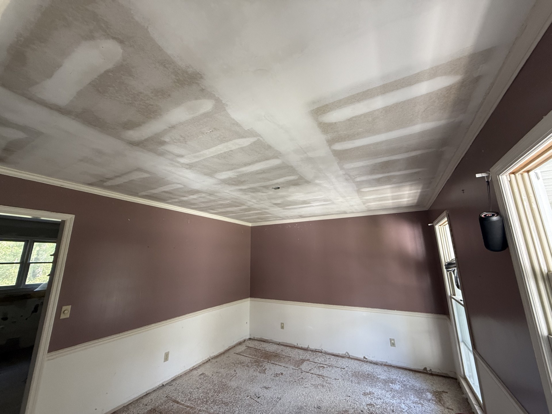 Popcorn ceiling removal in progress