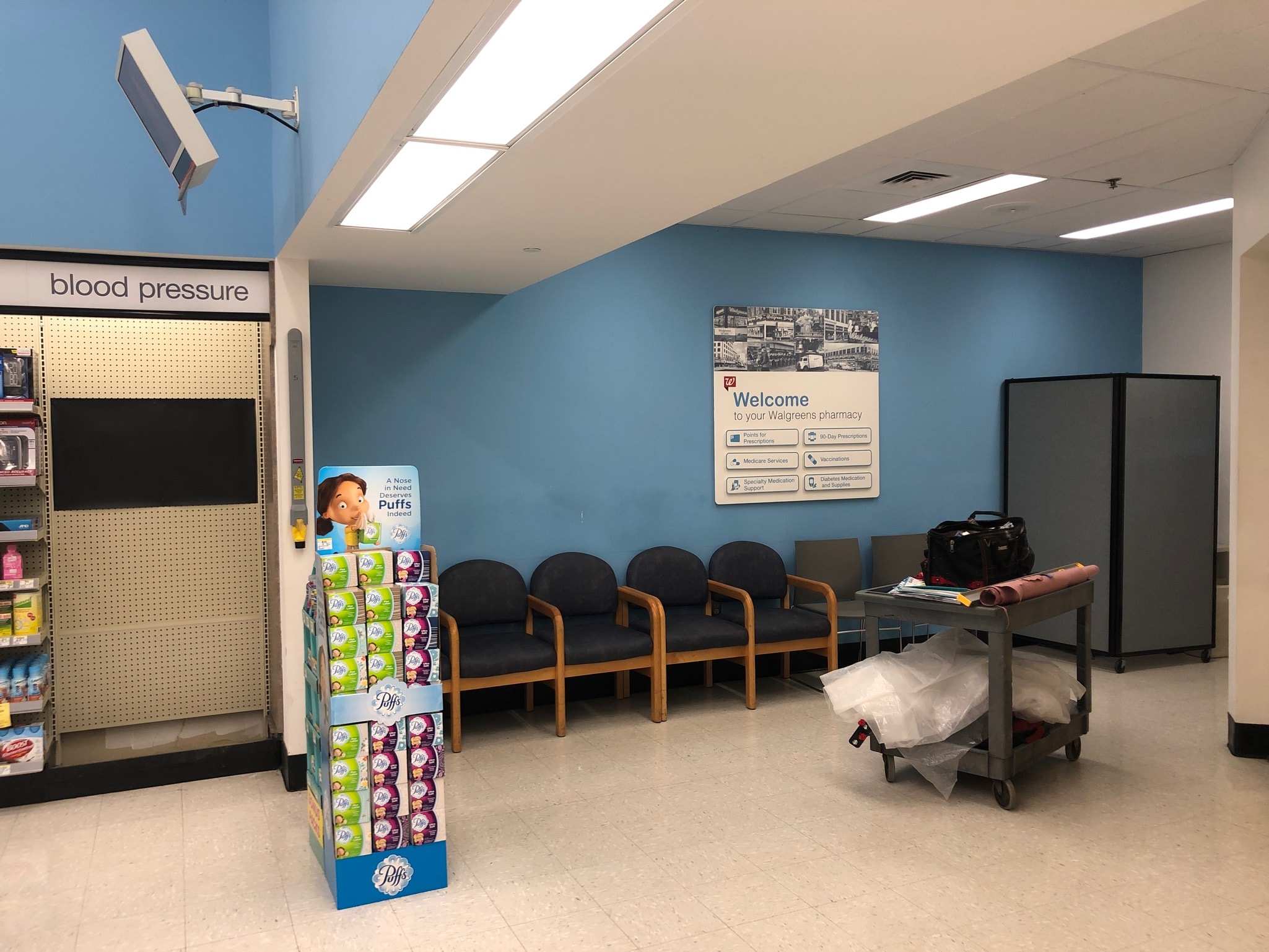 Walgreens pharmacy — completed patient health room, frosted glass door, new ceiling tiles and paneling