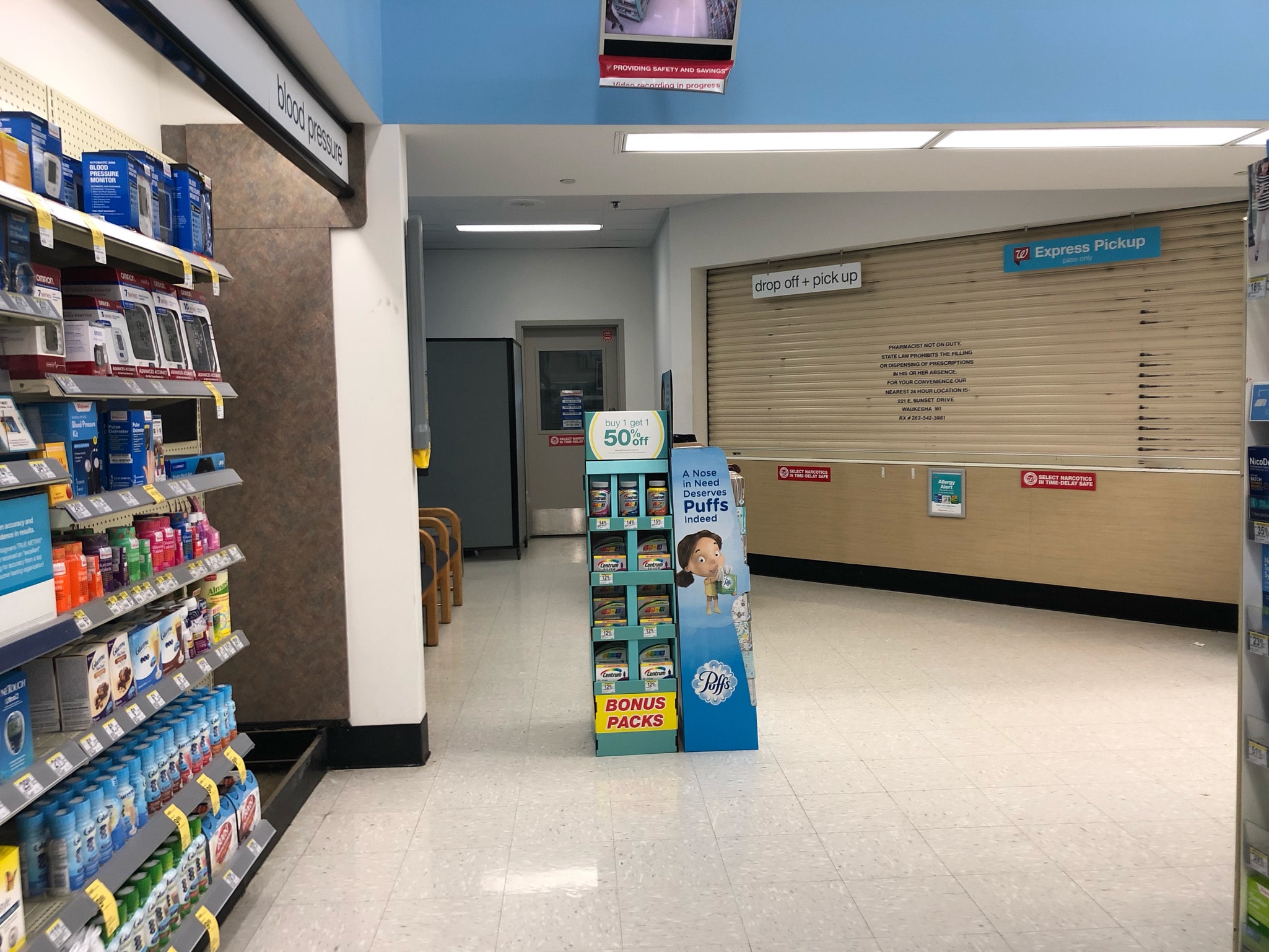 Walgreens pharmacy — before renovation, original pharmacy floor with old counters and tile
