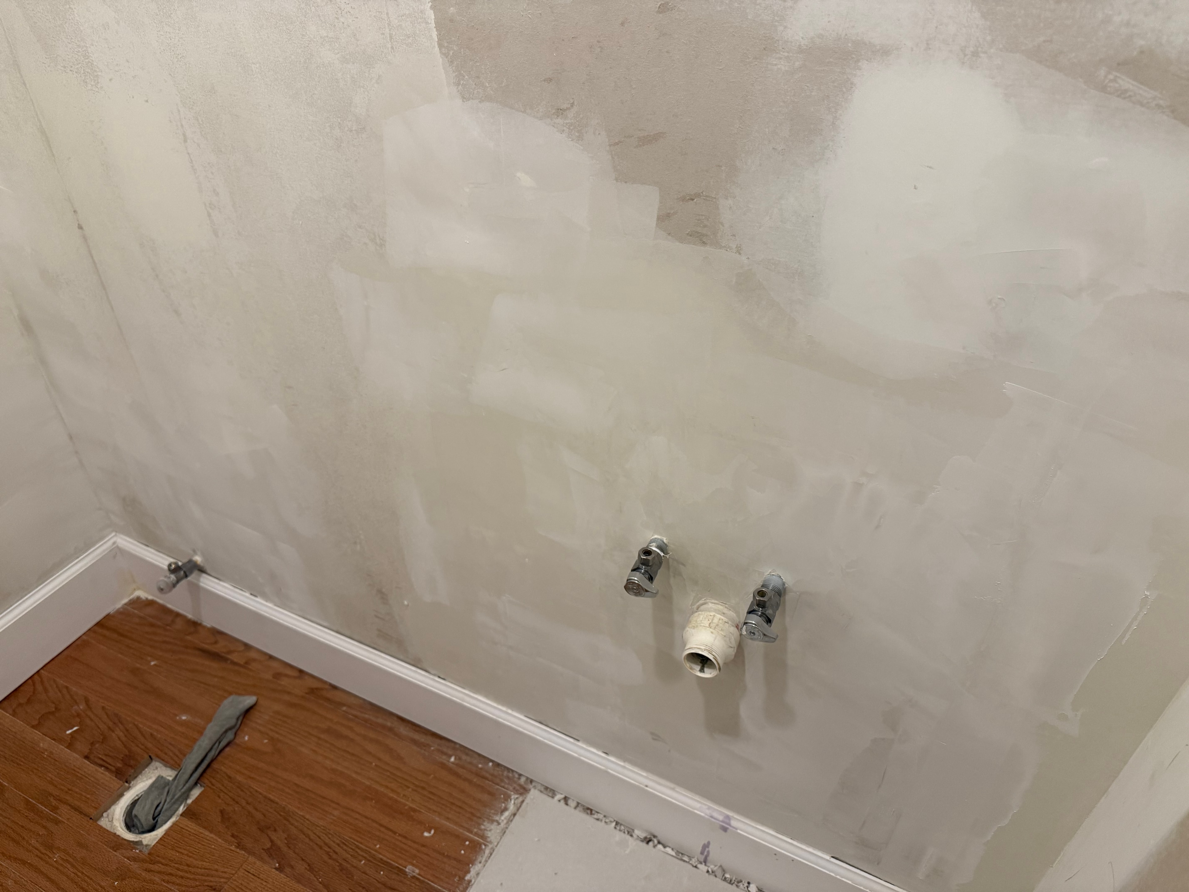 Smooth finish paint after wallpaper removal and plumbing patch work